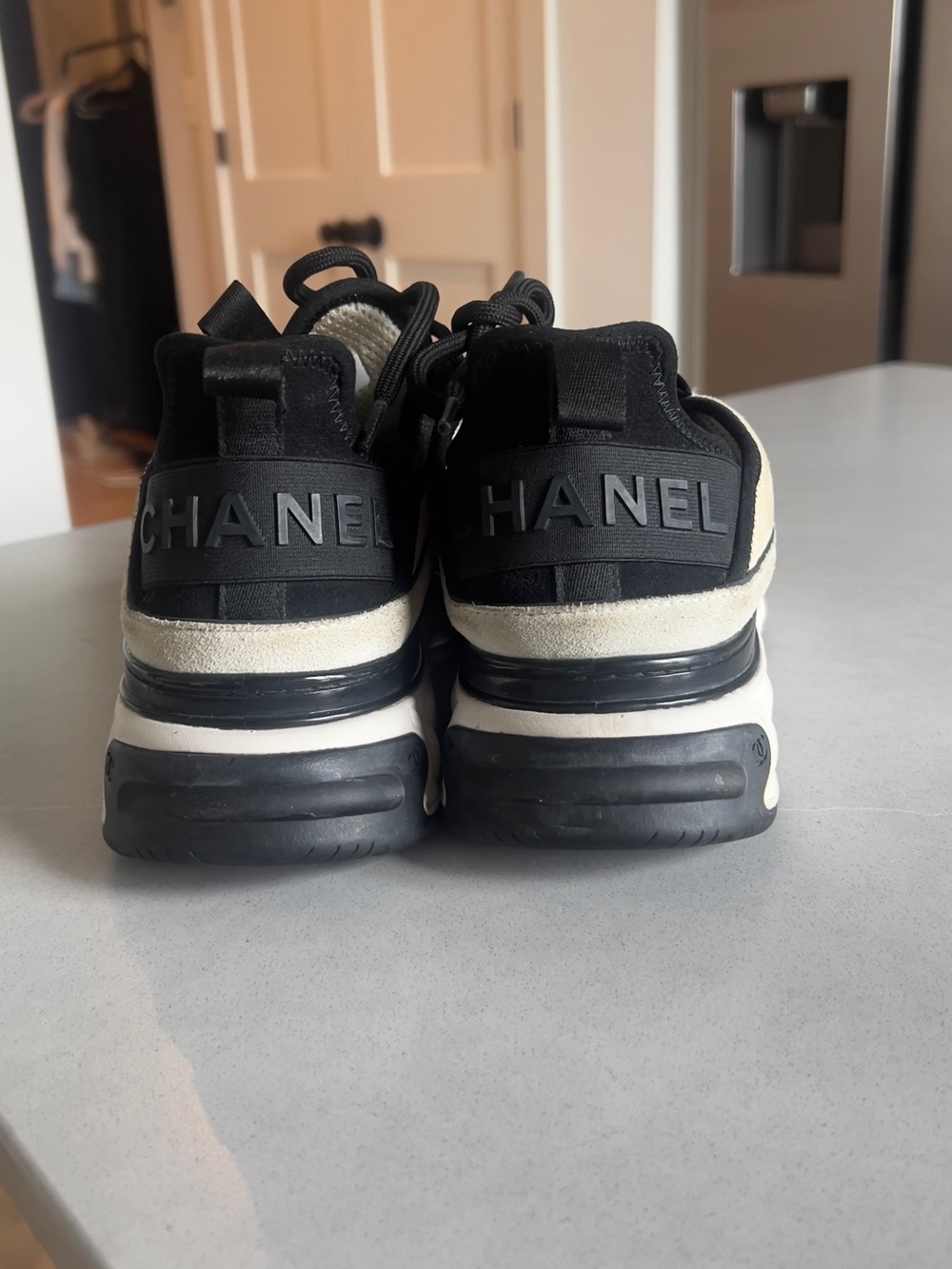 CHANEL Black and White Quilted-Trim Leather & Mesh Sneakers - Picture 4 of 9